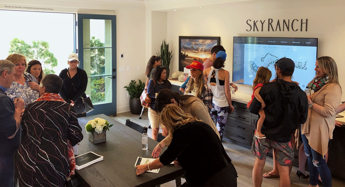 Homebuyers at Sky Ranch Sales office
